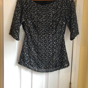 Banana Republic, size 4, sparkly black blouse with zip up back.